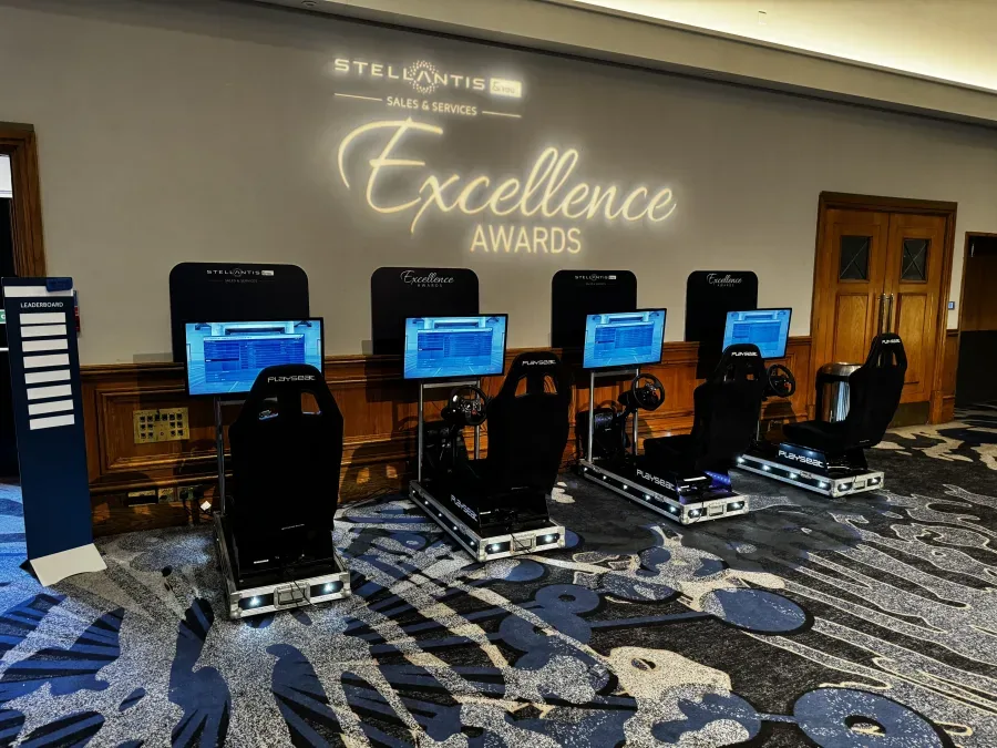 Branded racing simulator headers at a corporate awards evening