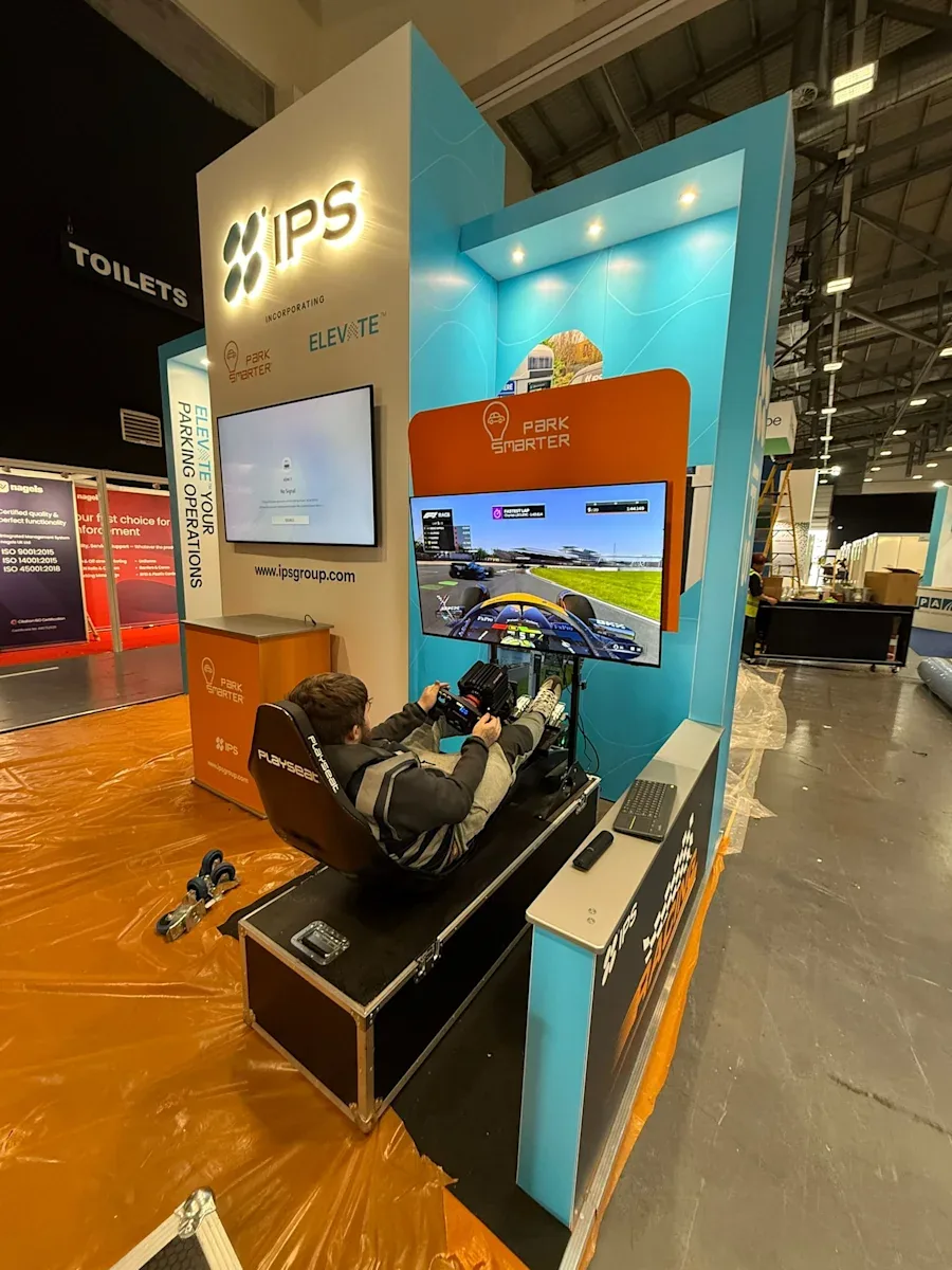 F1-style direct drive simulator on an exhibition stand